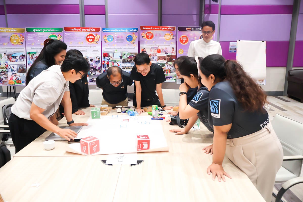 Participants engaged in a workshop on sustainable development practices.